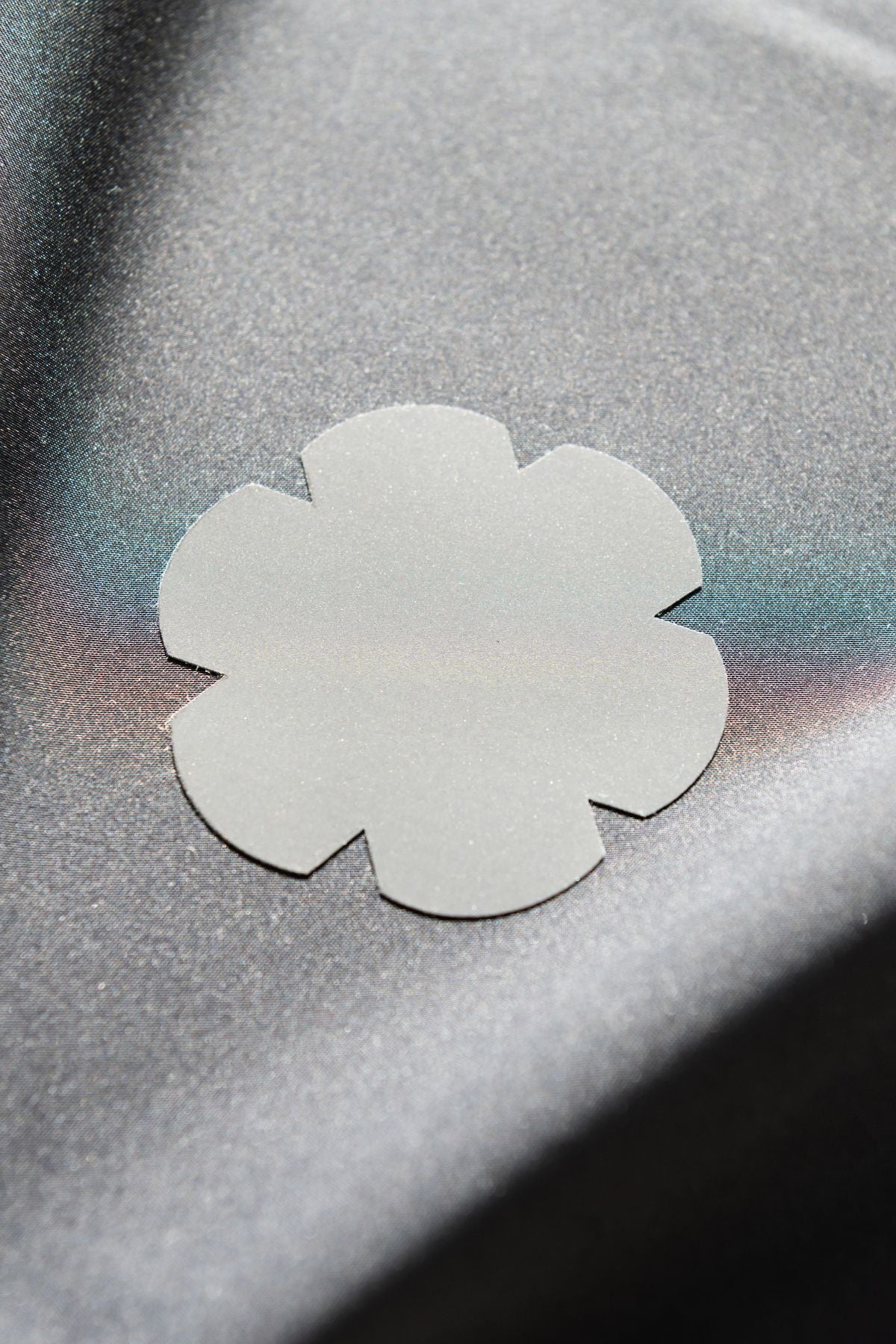 Loisto heijastava tekstiilipaikka